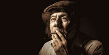 Photo of an Elderly Man Smoking