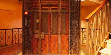 Swing door elevator