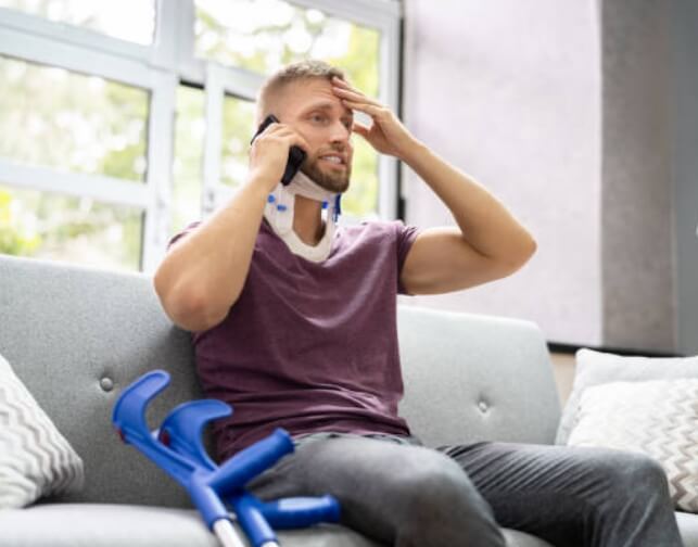 Injured worker on phone