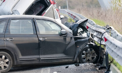 Chicago car accident with guard rail