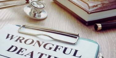 Wrongful death form and stethoscope on a table