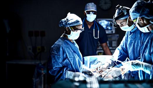 Shot of a team of surgeons performing a surgery in an operating room