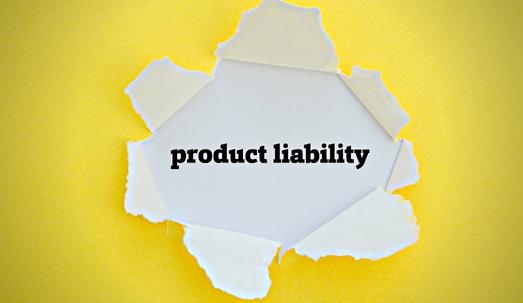 PRODUCT LIABILITY word written under torn paper.