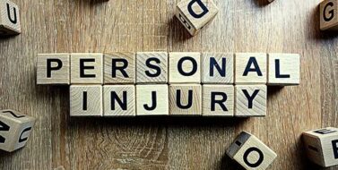 Personal Injury Text from Wooden Blocks on Desk