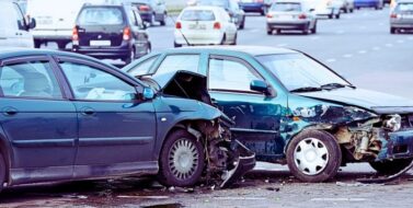 Damaged automobiles after collision in city. T-bone car accidents