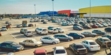 Car parking in the supermarket complex in the evening. parking lot accidents