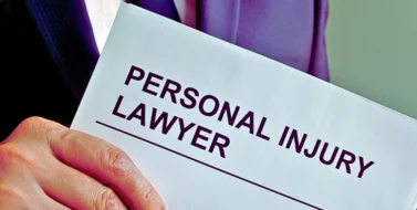 Personal injury lawyer with clipboard and law.