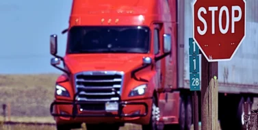 Big red truck and a stop sign. Liable in a Chicago Delivery Truck Accident
